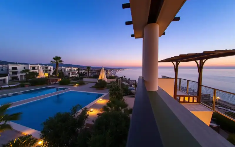 aerial view showcases Larnaca's vibrant cityscape and beautiful sea views from a luxurious villa